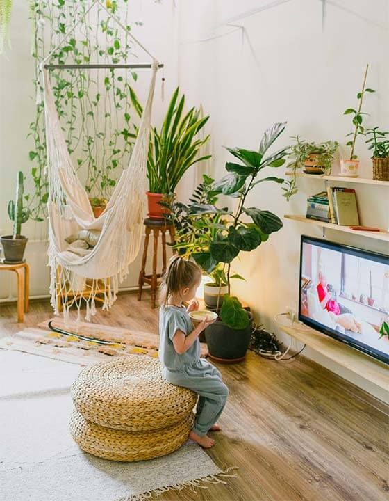 Kitchen with wooden table and hanging lights near Clearwater, FL.
